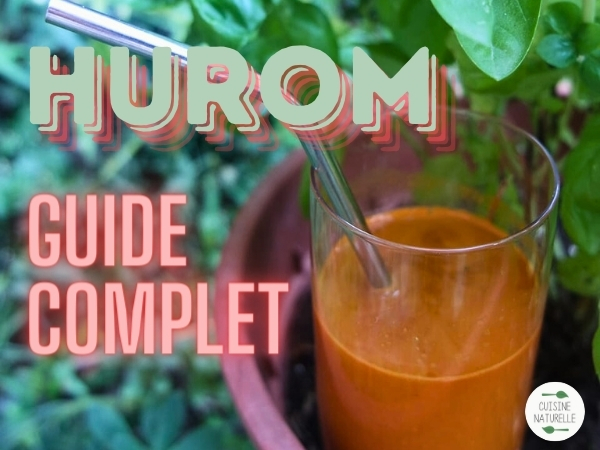 Hurom guide complet avec un verre de jus d'orange et une paille en inox